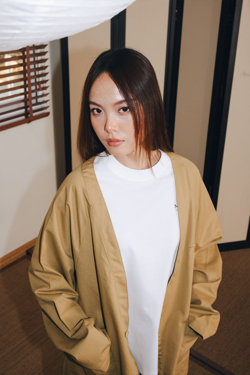 Zoey wearing the Workshop Cardigan by MINUS-E.